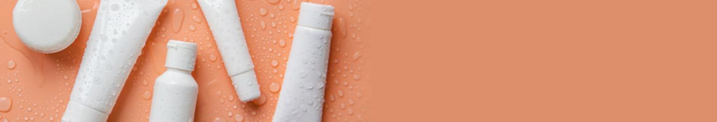 Moisturizing cosmetics on a wet background. Selective focus.