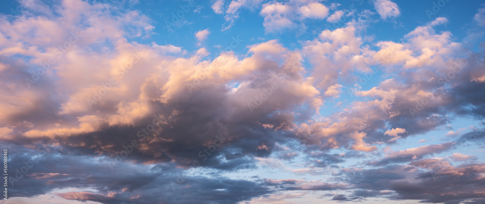 Wall mural panoramic background of evening sky with dramatic stormy clouds