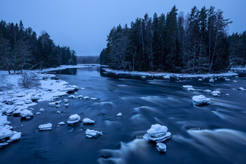 dusk over wide river during winter