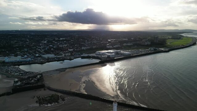 New Brighton waterfront, Wirral - aerial drone high reverse on a sunny winter afternoon 08.01.23