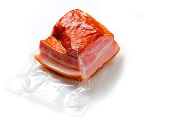 Traditional smoked pork ham on white background. Classic meat product ready to eat with layers of meat and fat and delicate flavor. Polish and East European popular meal.