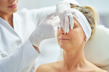 Fototapeta premium A scene of medical cosmetology treatments botulinum injection.