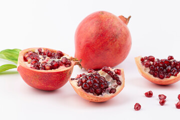 Piece of Fresh ripe pomegranate isolated