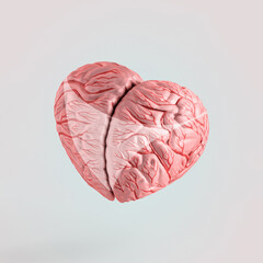 Heart-shaped coral pink brain with lighter bikini trace on isolated pastel beige background. Minimal abstract creative concept of love, passion, fantasy. Valentine’s day card.