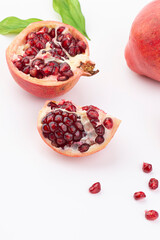 Piece of Fresh ripe pomegranate isolated