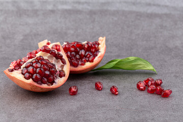 Piece of Fresh ripe pomegranate isolated