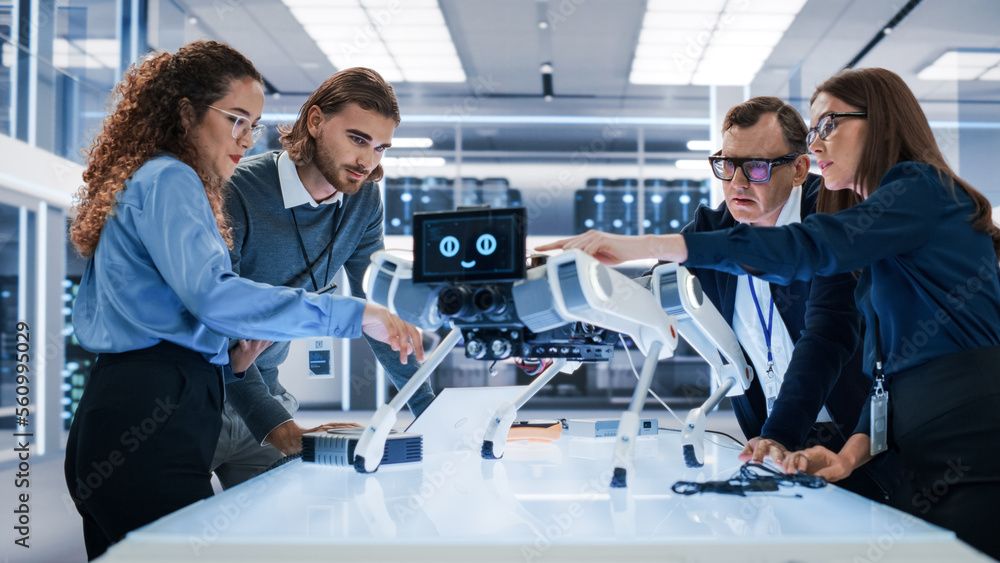 Poster Portrait of a Young Team of Multicultural Engineers Use Computers, Connect Microchips, Analyze and Discuss How a Futuristic Robot Dog Works. High Tech Research Laboratory with Modern Equipment.
