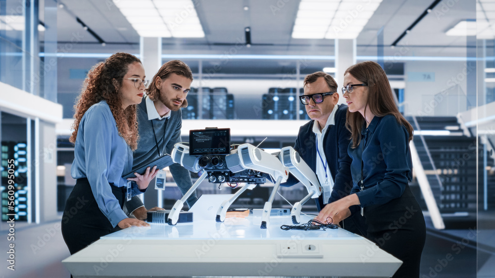 Poster Portrait of a Young Team of Multicultural Engineers Use Computers, Insert a Circuit Board, Analyze and Discuss How a Futuristic Robot Dog Works. High Tech Research Laboratory with Modern Equipment.