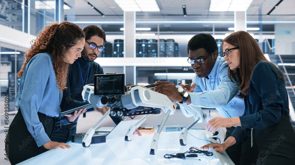 Poster Portrait of a Young Team of Multicultural Engineers Use Computers, Insert a Circuit Board, Analyze and Discuss How a Futuristic Robot Dog Works. High Tech Research Laboratory with Modern Equipment.