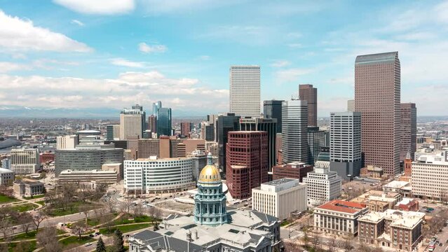 Aerial time lapse circling Denver, Colorado's downtown skyscrapers.