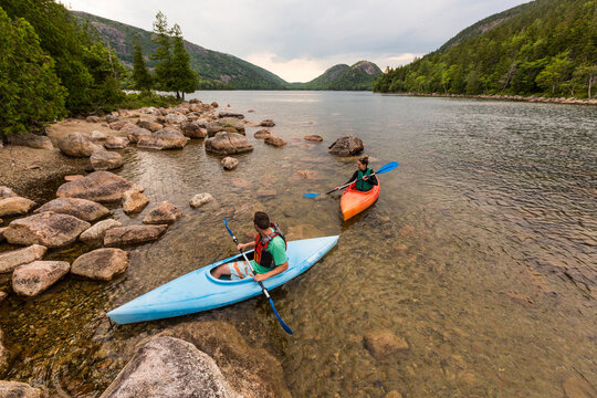 Couple kayaking on Jordan Pond in Acadia National Park, Maine, USA