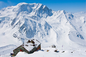 The Valsorey Hut overlooks grand views of Mont Velan along the classic Haute Route in the Swiss Alps.