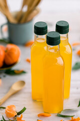 various salad vinegars in glass bottles. Front and top view. apple, lemon, strawberry, quince, grape, melon, apricot, tangerine, orange, grapefruit,