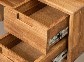 Opened drawers close view photo, wooden eco furniture elements background. Solid wood furniture...