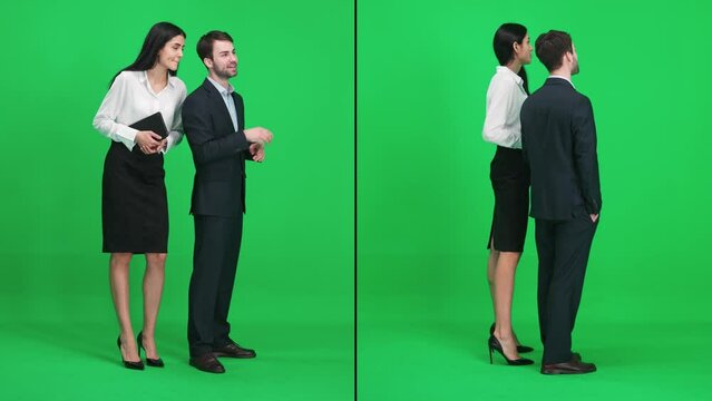Split screen, man and woman in suits stands in the green space of the chromakey, discuss subjects while looking in front of them, a template on a green background, realtors at work.