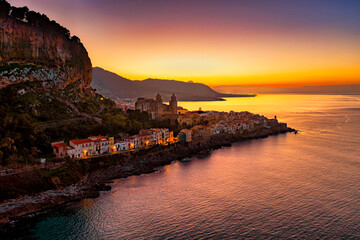 Panoramic aerial drone view of the Cefalù, Sicily, Italy by sunset night. Litttle town in Sicily...