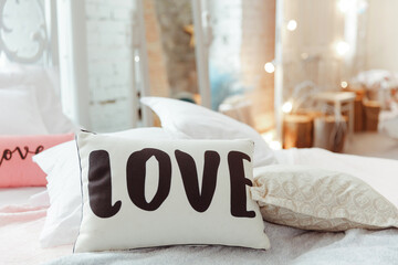 White pillow with the inscription 