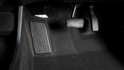 Car accelerate and brake foot pedal. Close up foot press or push foot break and accelerate pedal of...