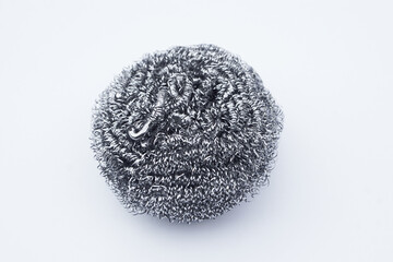 Stainless steel wool scrubbers for scrubbing pots,  on white background. Concept, kitchen cleaning tool. Utensil. Household.      