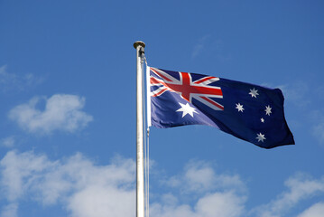 Australian flag flying on flag pole