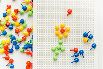 Children's mosaic on a white background. Child Game. Colored mosaic.