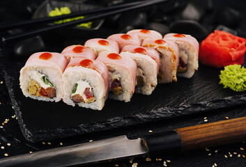 Japanese sushi traditional on black dish