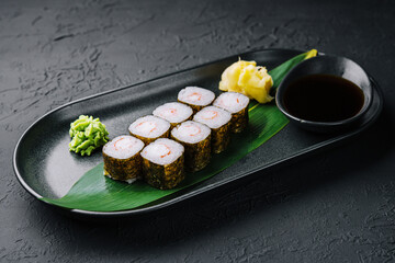 Traditional fresh japanese sushi maki on black stone plate © AntAlexStudio