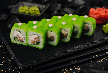 California sushi rolls with tuna and green caviar