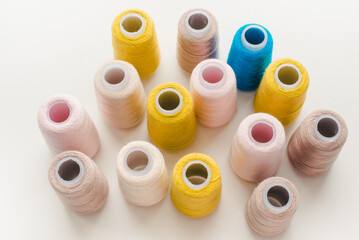 Thread spools. Bobbins with colored threads.