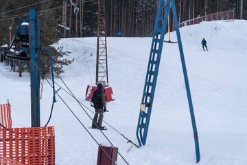 photo of people at the ski resort, ski lift