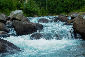 Fototapeta na wymiar waterfall in the forest - stock photo