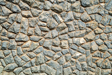 Gray stone wall. Horizontal image. Space for advertising.