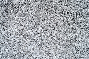 Gray plastered wall. Horizontal image. Advertising space.