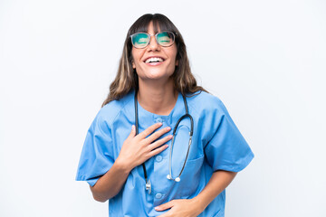 Young caucasian nurse woman isolated on white background smiling a lot