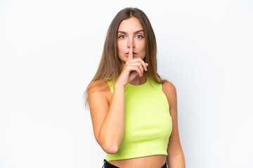 Young caucasian woman isolated on white background showing a sign of silence gesture putting finger...