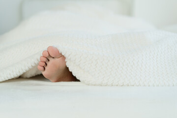 feet in bed