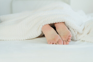 feet in bed