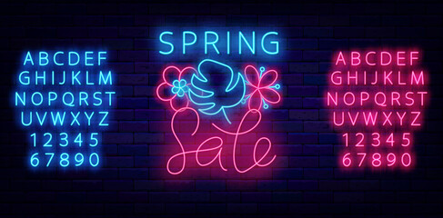 Spring sale neon signboard. Monstera leaf and flowers. Shiny blue and pink alphabet. Vector stock illustration