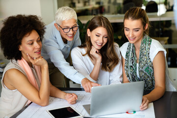 Collaboration and analysis by business people working in office