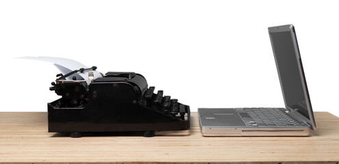Antique old vintage retro typewriter and laptop