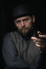 stylish man in retro outfit suit hat smoking wooden pipe sherlock holmes look cosplay england gentleman fashionable confident gangster Guy Ritchie Charlie Hunnam style