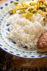 Rice porridge with vegetables and meat