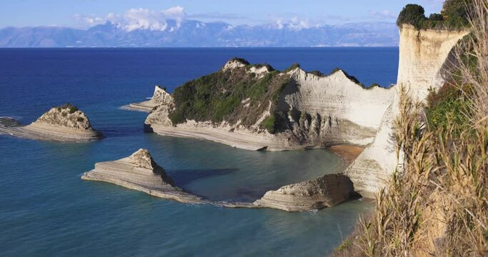 Cape Drastis, beautiful sunny landscape of Akra Drastic, Peroulades village, Corfu island, Greece, with turqoise water and sea beach, Kerkyra, Ionian islands, summer day