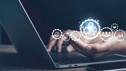 Operation management Business process control optimisation industrial technology and workflow concept. Problem solving, High performance, quality control. Hand using laptop with virtual gears icons .