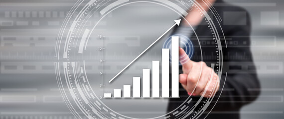 Woman touching a financial growth concept