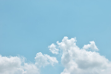 Light blue sky and white clouds. With copy space.	