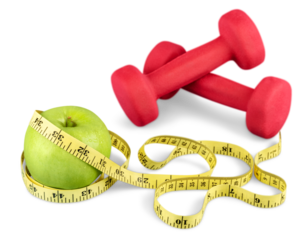 Green apple with a yellow measuring tape and Weights