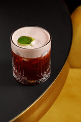 Alcohol cocktail on the table in bar.