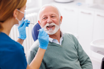 Senior man having dental checkup