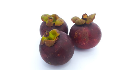Close up of ripe mangosteen fruit isolated on white background